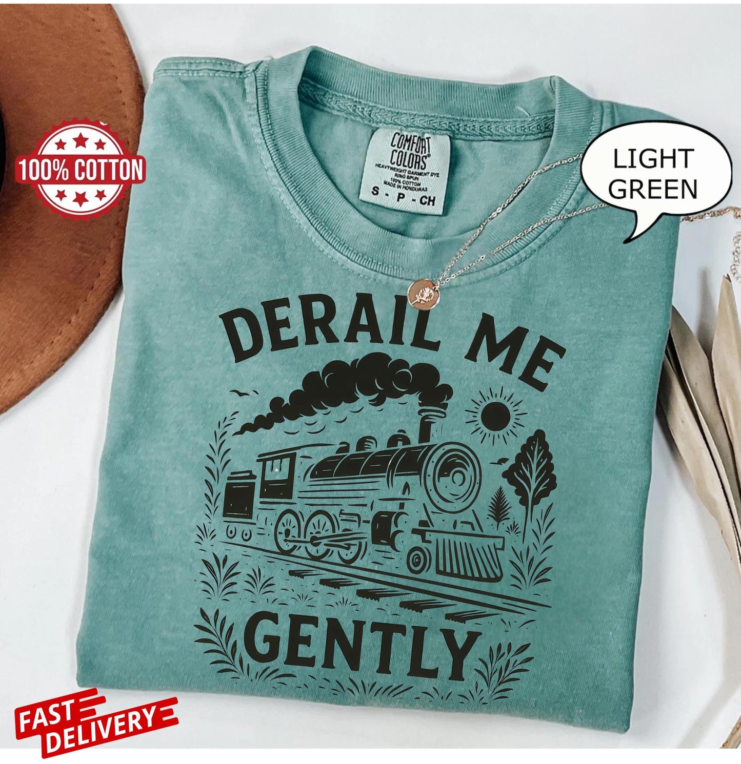 bold train t-shirt with derail me gently slogan, vintage locomotive art on unisex tee for quirky adults and alternative gift giving